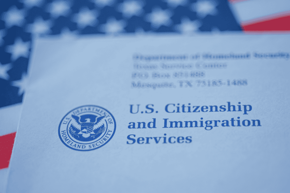 U.S. Citizenship and Immigration Services document with an American flag background, related to Houston EB5 investment programs and immigration services for USA permanent residency.
